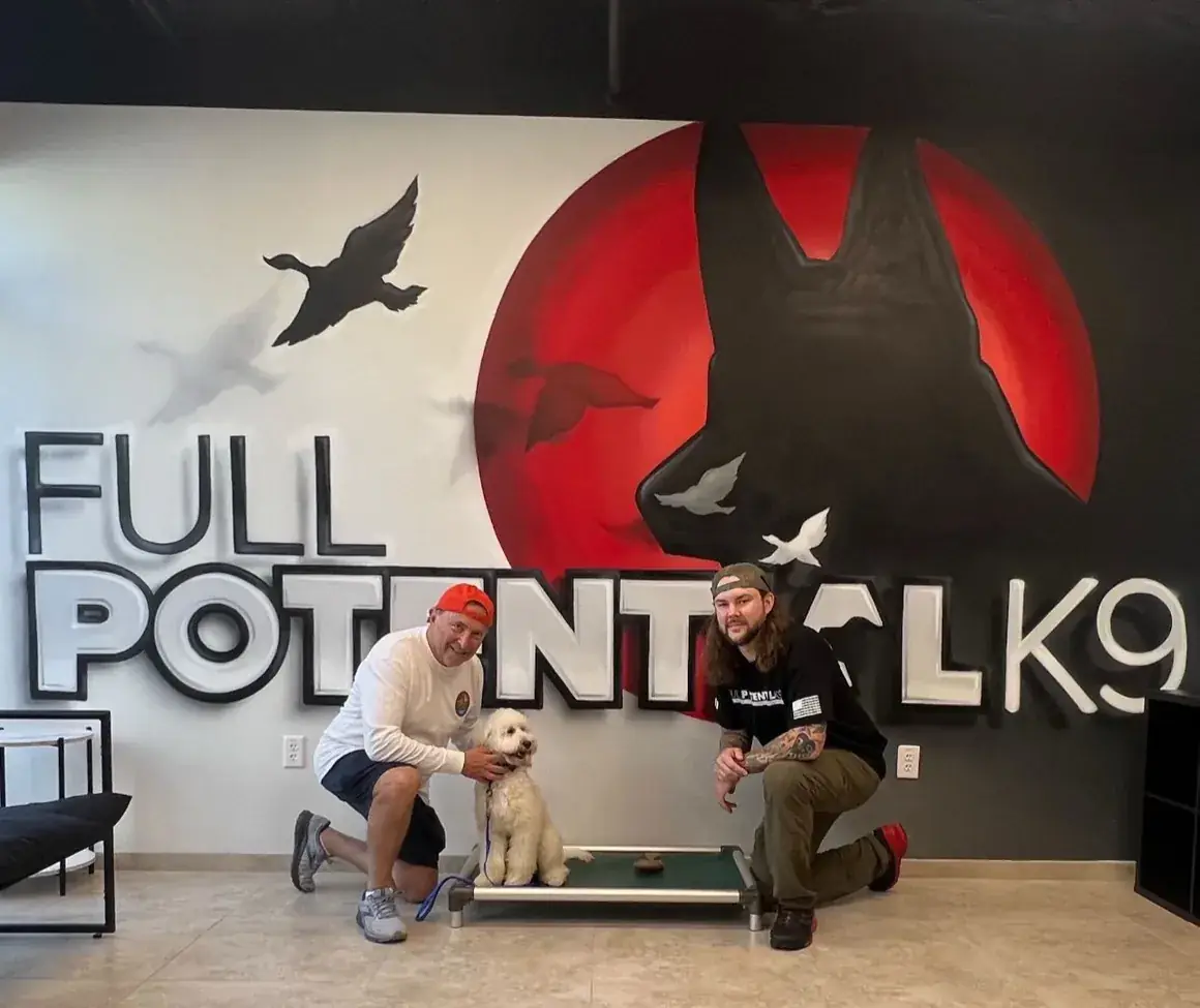 Trainers and dogs in the Full Potential K9 facility in Boca Raton